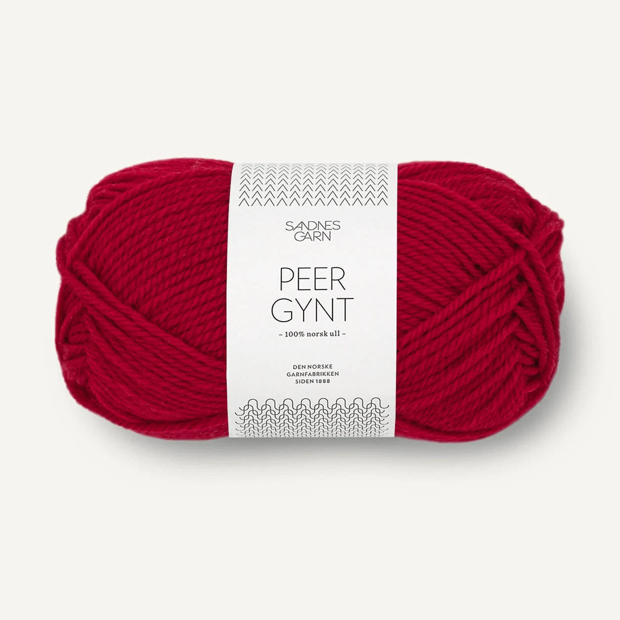 Red skein of yarn with a label on a white background