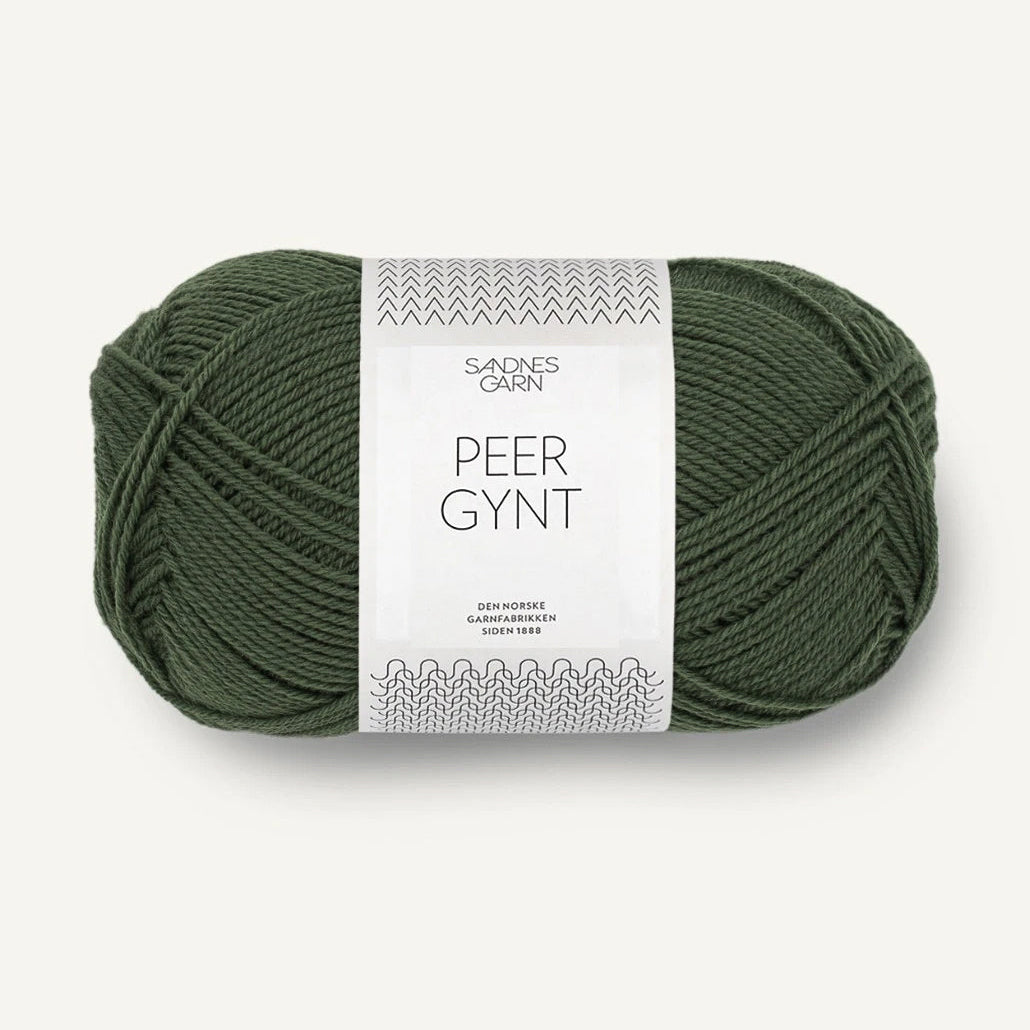 Green skein of Sandnes Garn
yarn with a label on a white background