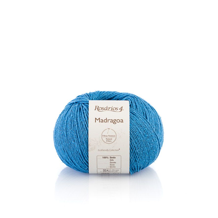 Blue skein of yarn with a label on a white background