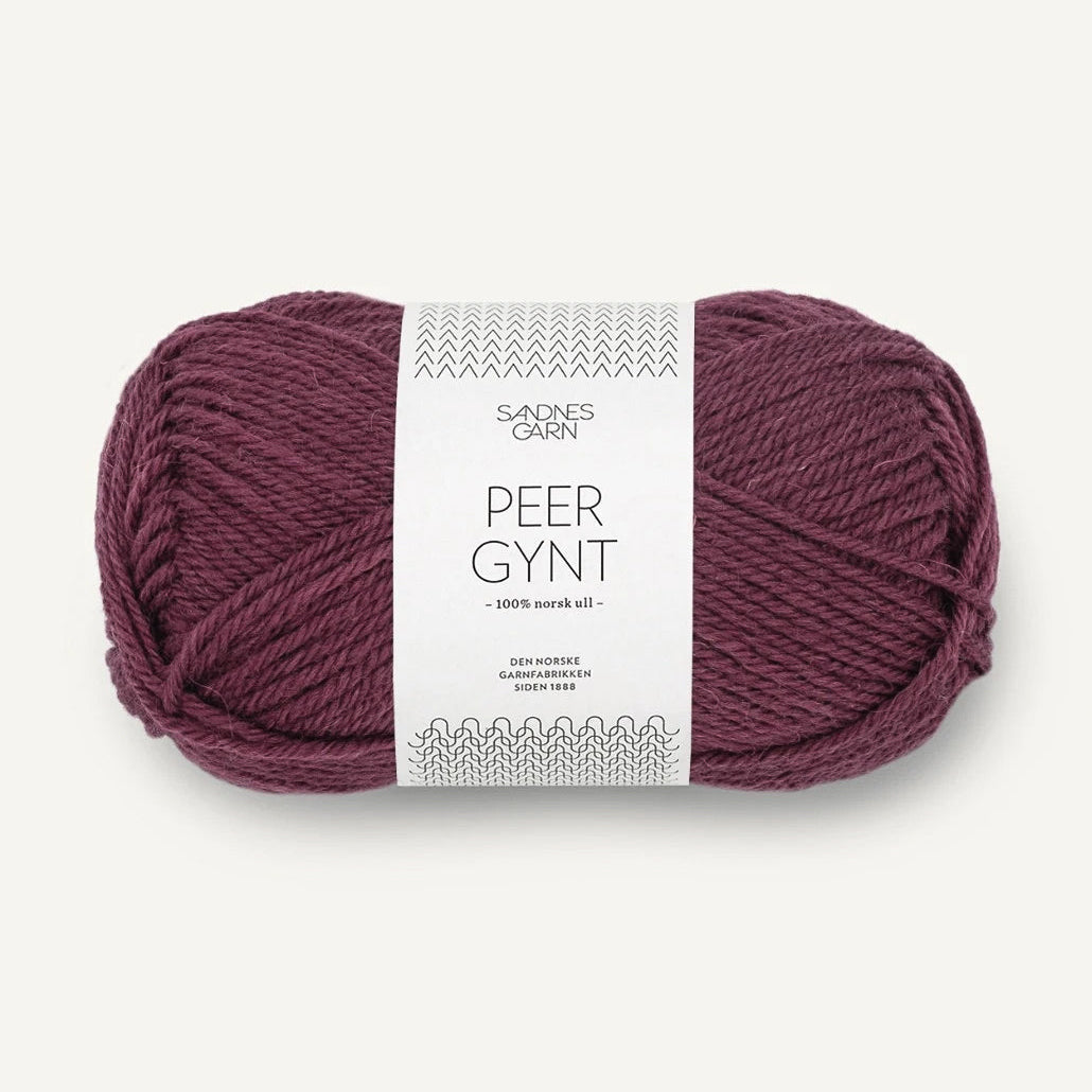 Ball of Sandnes Garn yarn with a label on a white background